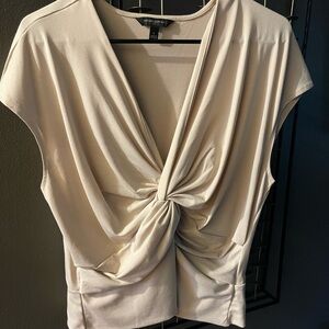 Cream cap sleeve blouse.